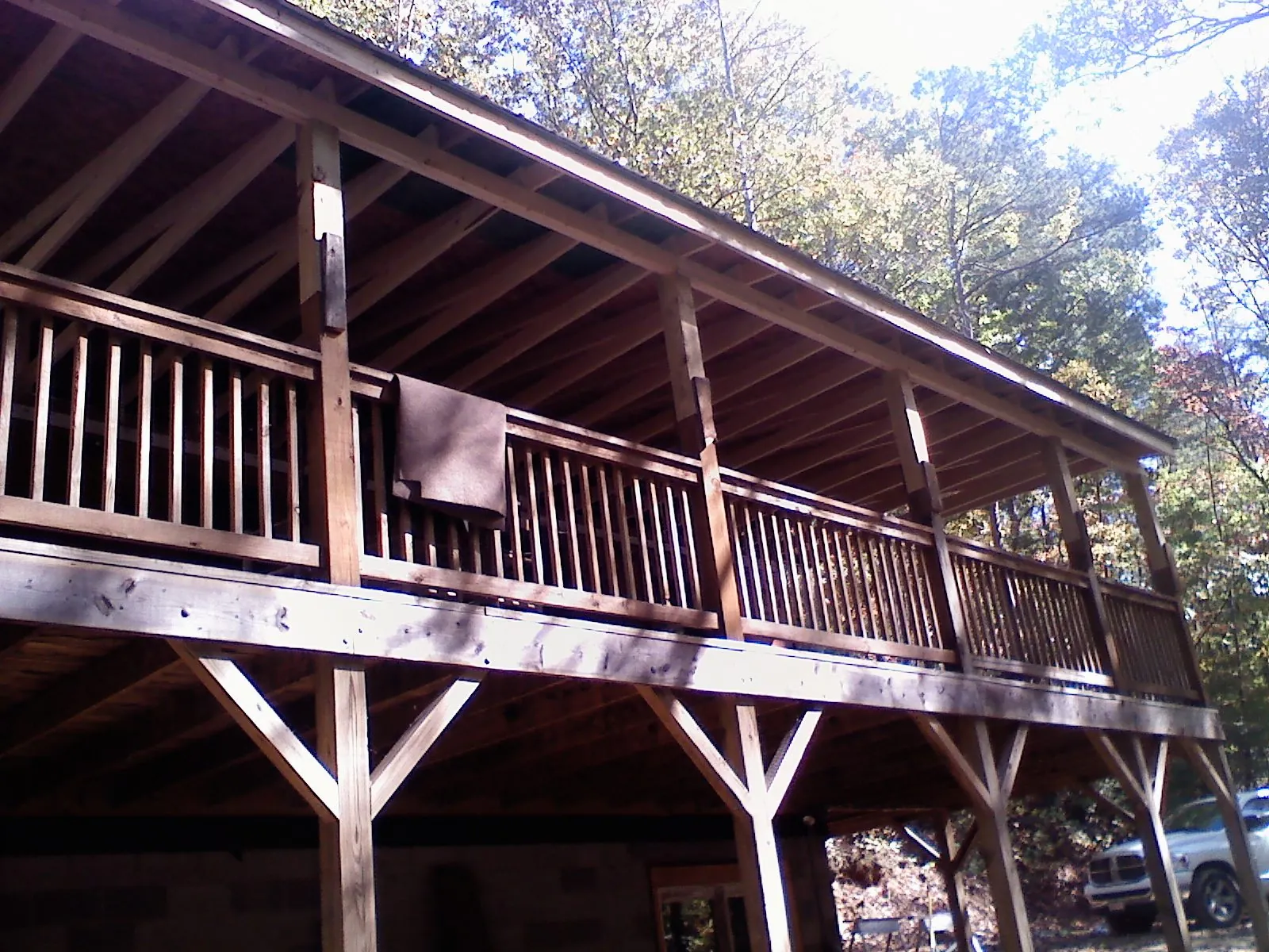 Timber framing under a new elevated porch and deck — Roof Leak Repair in Saint Paul by Roofing Brothers